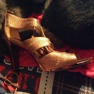 Metallic gold heels
